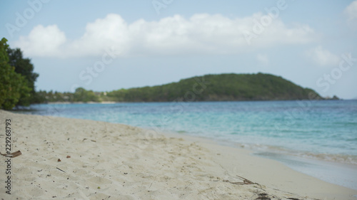 Background Plate of Sand-level shot of the Caribbean shoreline for green screen