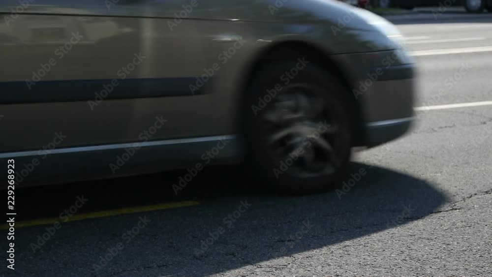 Street traffic in a city, unfocused background.
Street traffic in a city, unfocused background.