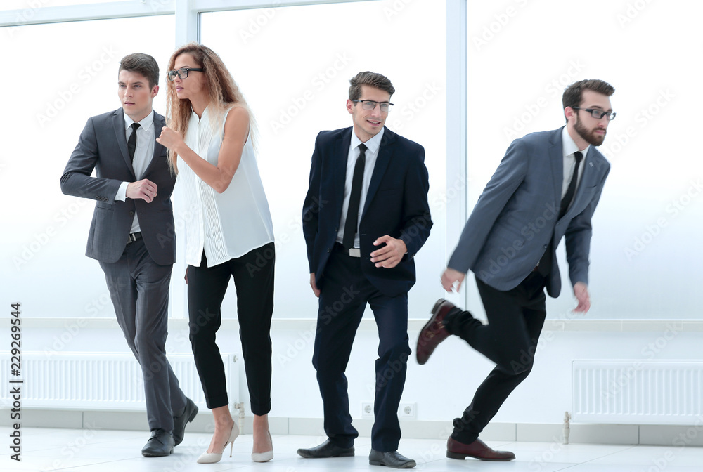 group of confused young businessmen walking in different directi group of confused young businessmen walking in different directi