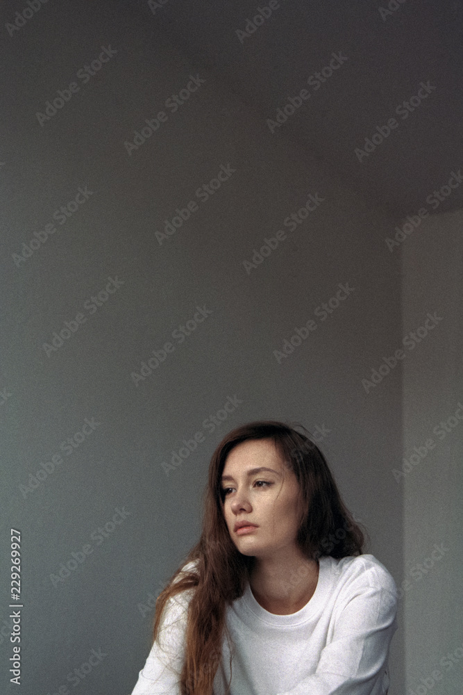 Pensive woman looking away Pensive woman looking away