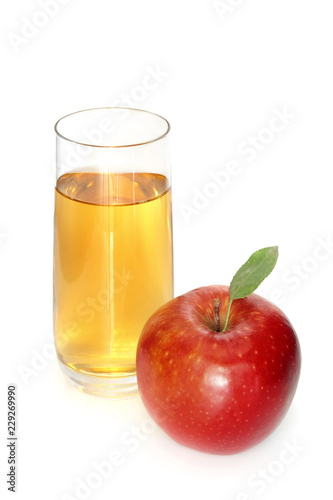 Glass of apple juice and red apples isolated on white background

