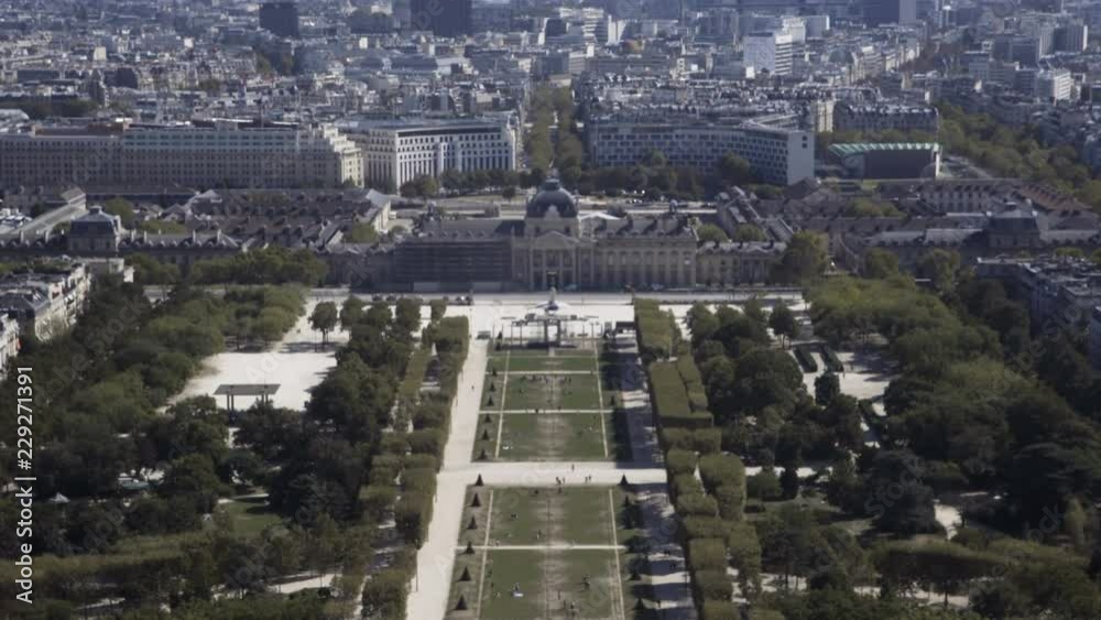 Perspective view of green Champ de Mars from height of Eiffel Tower in sunny day, Paris Perspective view of green Champ de Mars from height of Eiffel Tower in sunny day, Paris