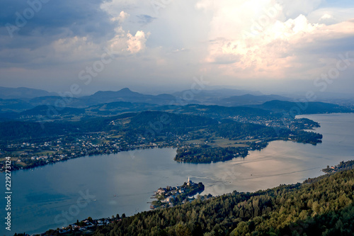Evening view from observation tower Pyramidenkogel to mountains and lake Woerth,Carinthia,Austria