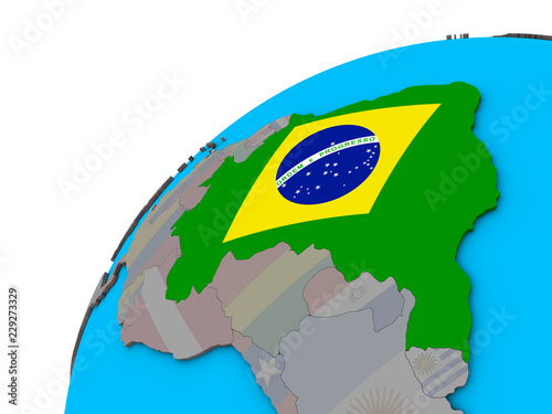 Brazil with national flag on 3D globe.