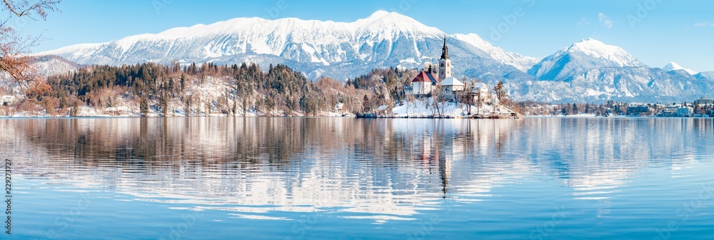 Lake Bled with Bled Island and Castle at sunrise in winter, Slovenia