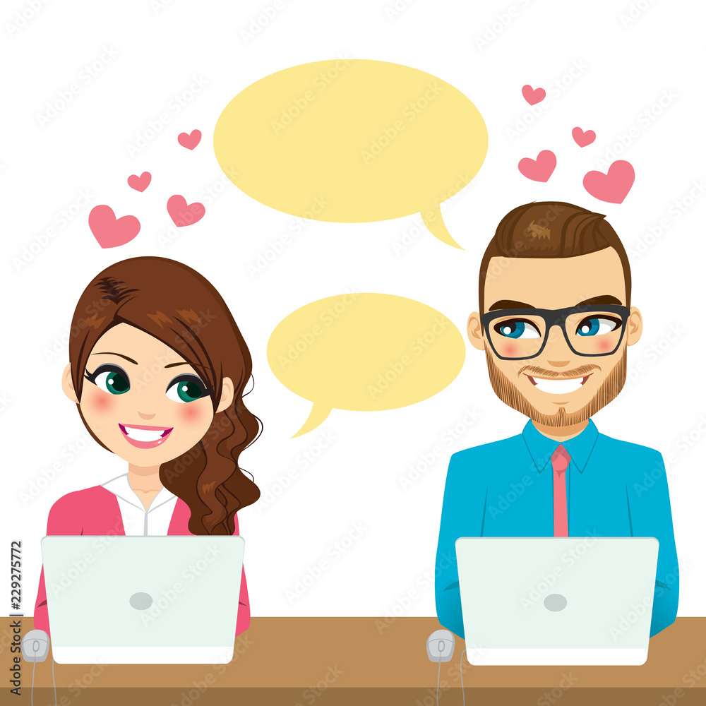 Couple flirting while working with laptop over desk Couple flirting while working with laptop over desk