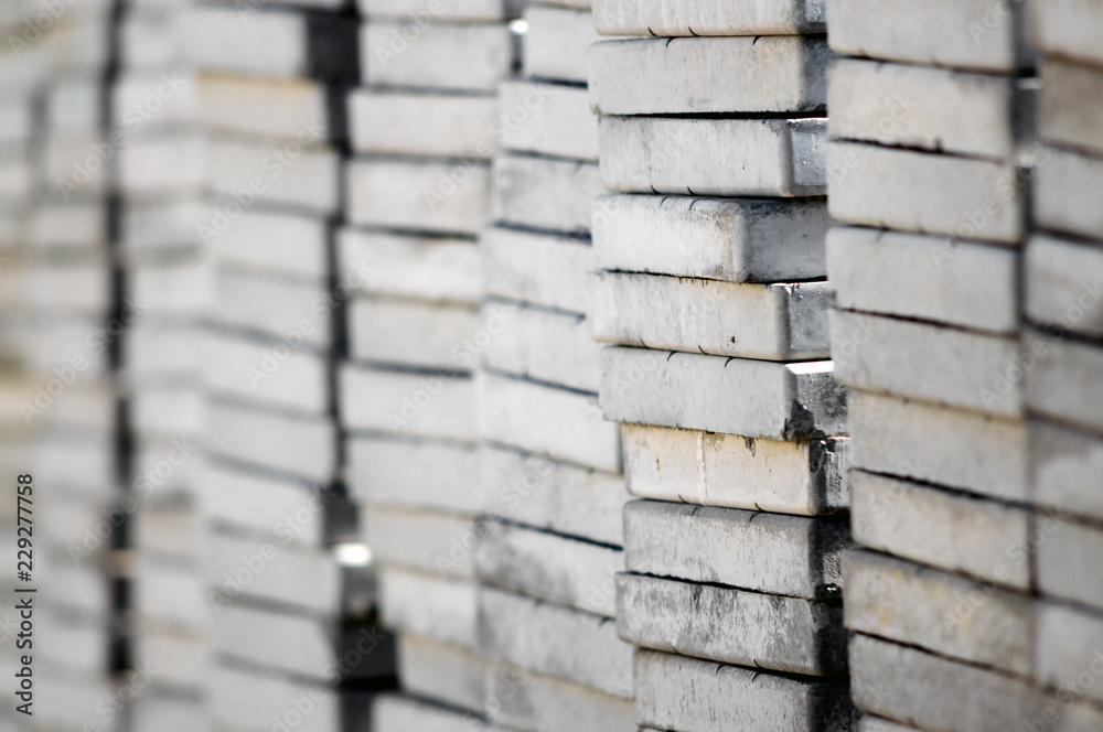 Pile of concrete blocks, close-up, shallow depth of field Pile of concrete blocks, close-up, shallow depth of field