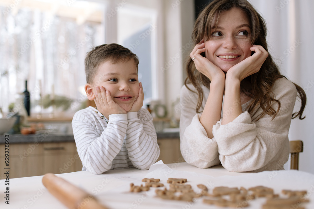 Mother and son at cookies Mother and son at cookies