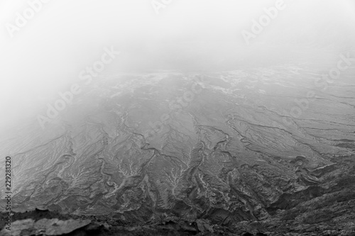 Black and white image of a foggy floodplain photo