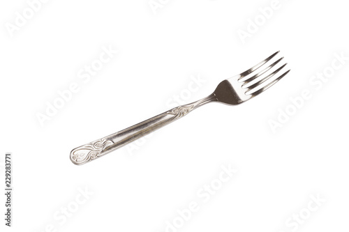 Old iron fork on white background