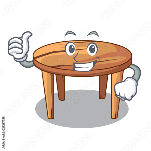 Thumbs up cartoon round wooden table in cafe