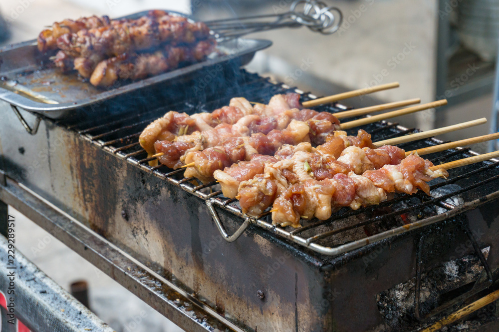 Meat barbecue on street market in Hanoi, Vietnam, Asia