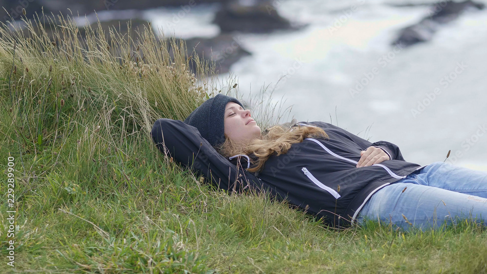 Pretty girl relaxes at the waterfront Pretty girl relaxes at the waterfront