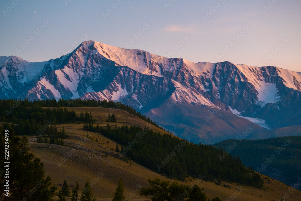 Mountains and hills. Northen Chuysky Range during sunset. Altai Republic, Russia