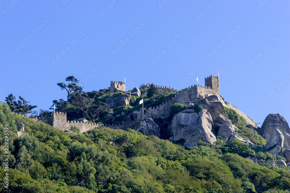 View from downtown of Sintra to a half part of the medieval Castle  of the Moors on a hilltop,in Portugal near Lisbon; Sintra Cultural Landscape,  UNESCO World Heritage Site