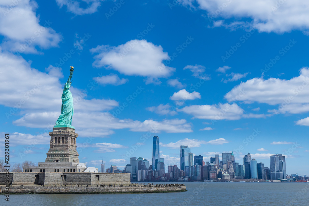 The Statue of Liberty and Manhattan, New York City, USA