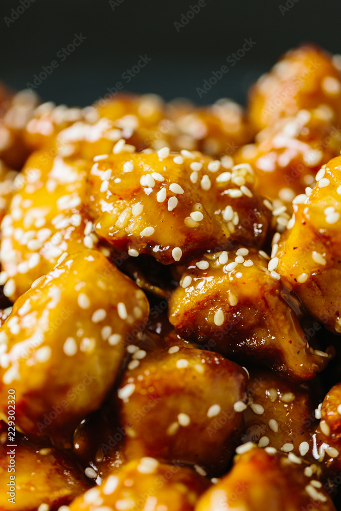 Close up of caramel sesame chicken Close up of caramel sesame chicken