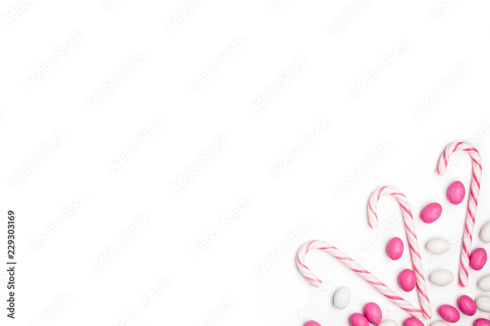 Frame Pink and White candies and lollipops Top view White Background Valentine's Day Frame Pink and White candies and lollipops Top view White Background Valentine's Day