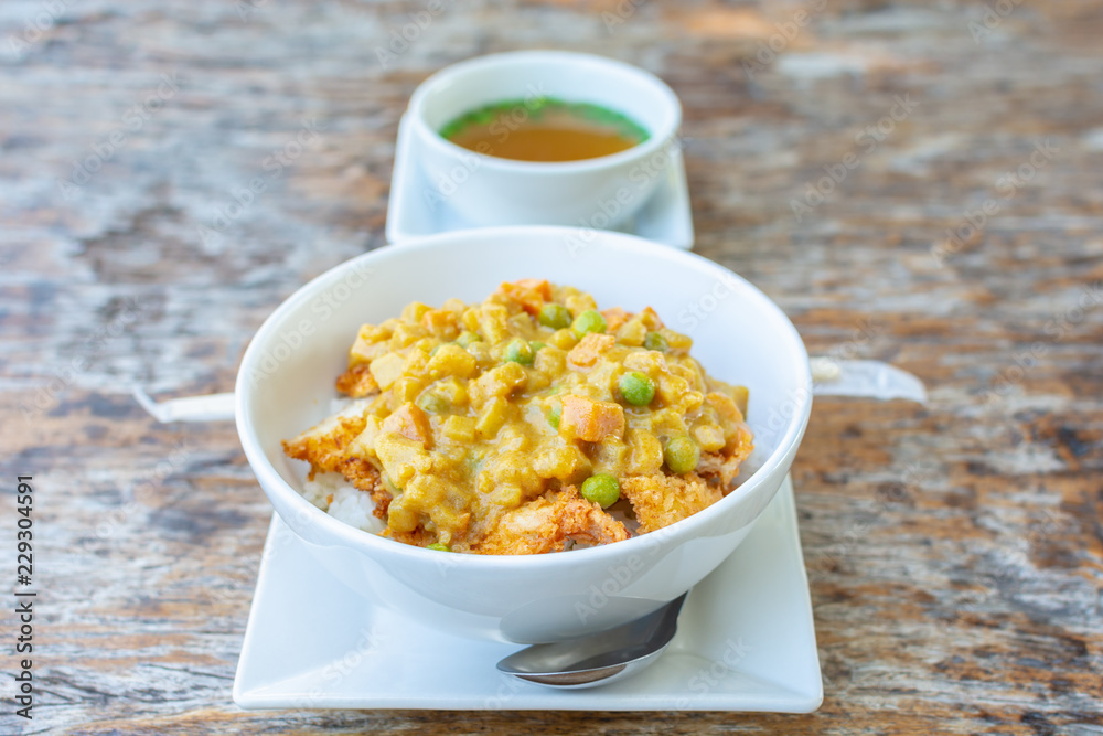 Japanese curry served with Japanese rice in white bowl clean and healthy food. Japanese curry served with Japanese rice in white bowl clean and healthy food.