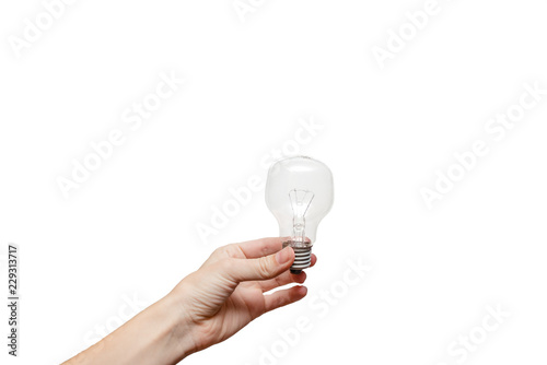 Female hands holding a light bulb. Idea and electicity Concept. European , white background, isolated