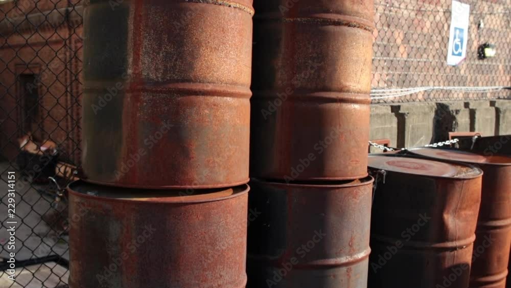 Rusty oil drums tilt up Rusty oil drums tilt up