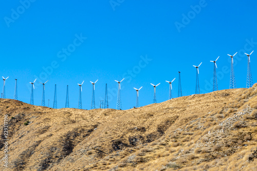 Wind turbines on the horizon, in the Californian countryside