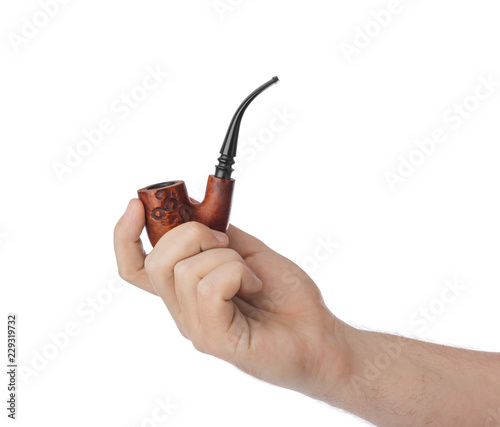 Hand with smoking pipe photo