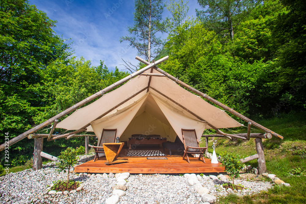 Glamping tent exterior in Adrenaline Check eco camp in Slovenia.