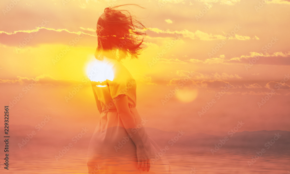 Double exposure of young woman and sunset sky. - obrazy, fototapety, plakaty 