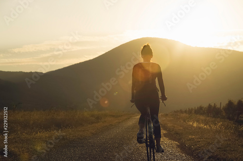 Cycling in sunset. Lifestyle concept.