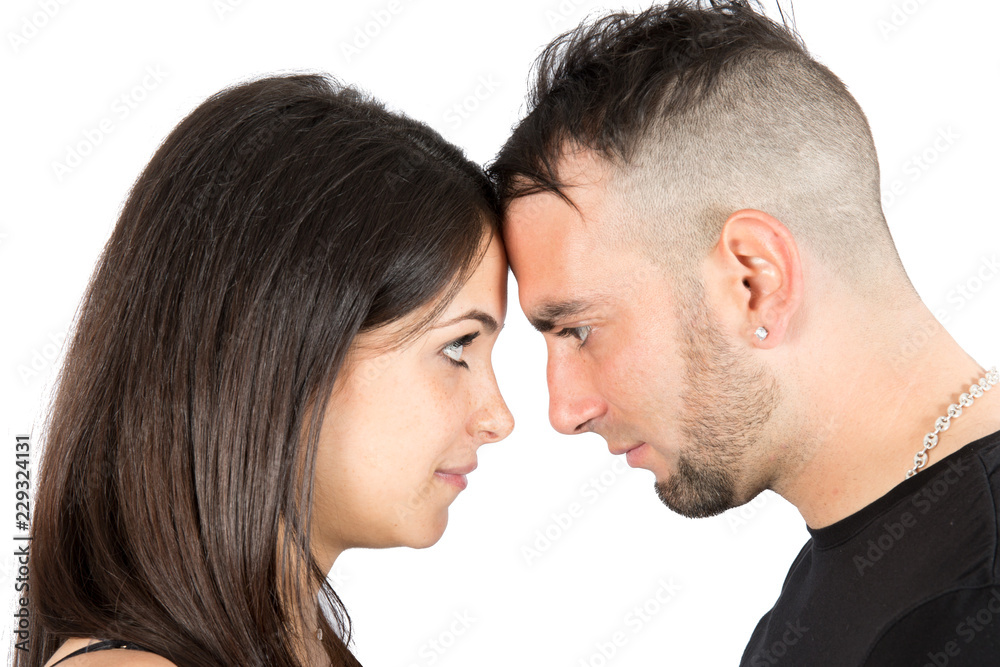 Portrait of a beautiful young happy couple forehead front touch Portrait of a beautiful young happy couple forehead front touch