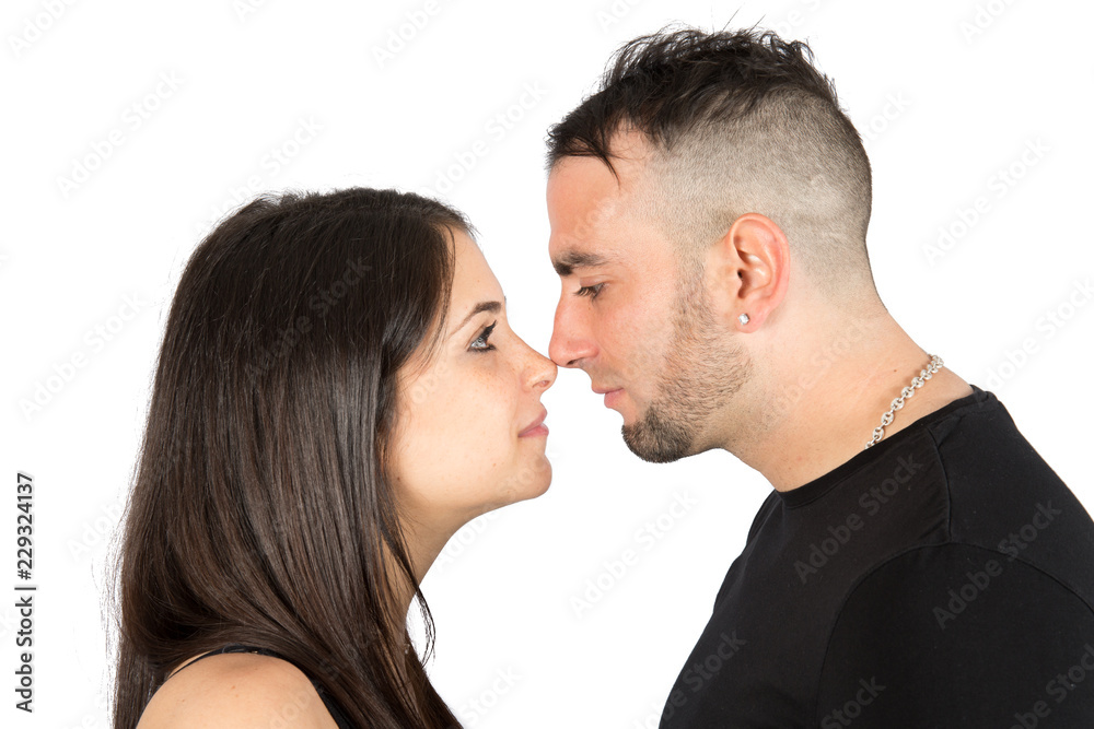 Happy moments of young couple in love on white background Happy moments of young couple in love on white background
