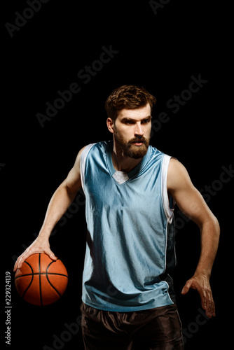 Basketball player in blue uniform © yuriygolub