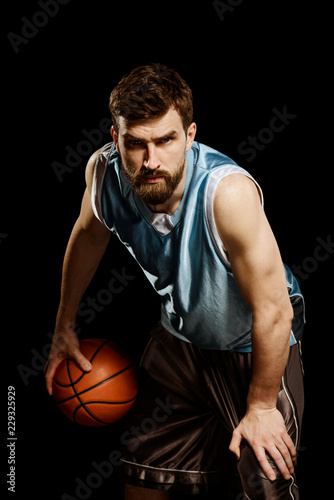 Basketball player with a ball © yuriygolub