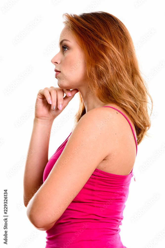 Profile view of young beautiful Brazilian woman thinking Profile view of young beautiful Brazilian woman thinking
