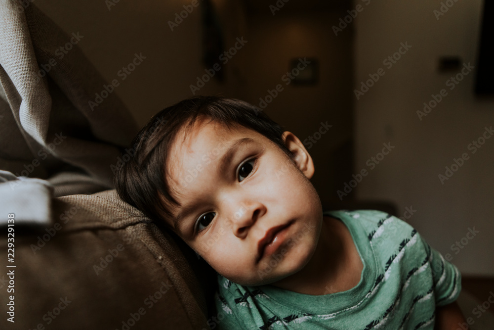 Skeptical face portrait of a kid