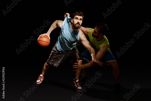 Game of two basketball players © yuriygolub