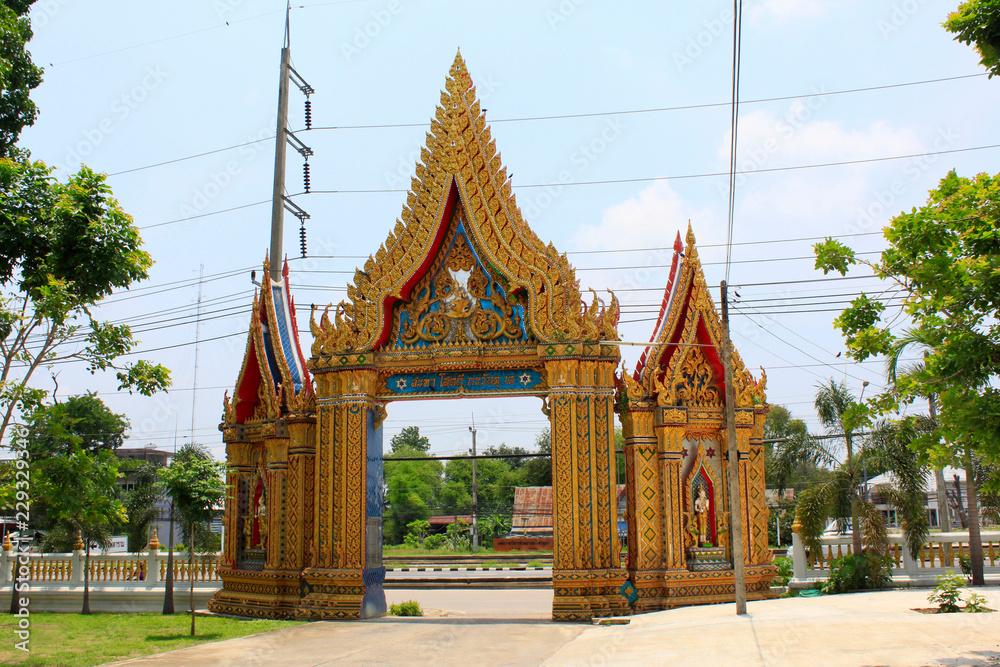 Golden gate to a Buddhist temple and monastery at Ban Bung Sam Phan Nok, Phetchabun, Thailand.