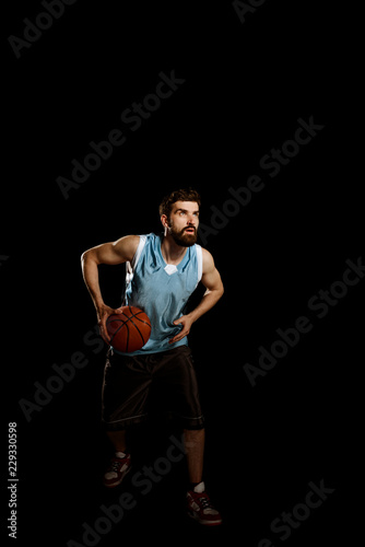 Basketball player preparing to jump