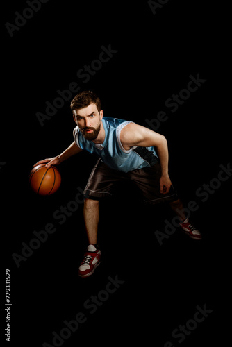 Player dribbling a basketball © yuriygolub