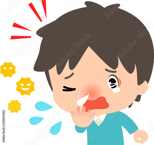 アレルギーでクシャミをする若い男性