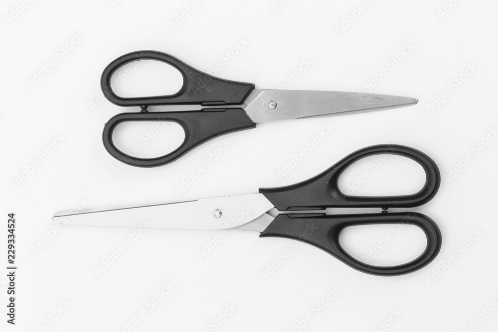 two black scissors isolated on white background two black scissors isolated on white background