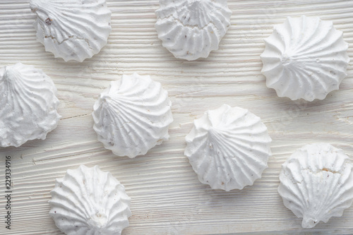 French vanilla meringue cookies close up white background.