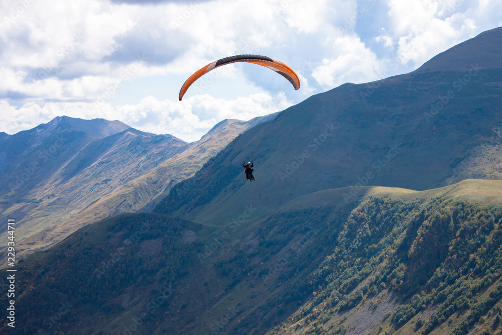 Aerial view. paragliding in mountains of Kazbegi. Aerial view. paragliding in mountains of Kazbegi.