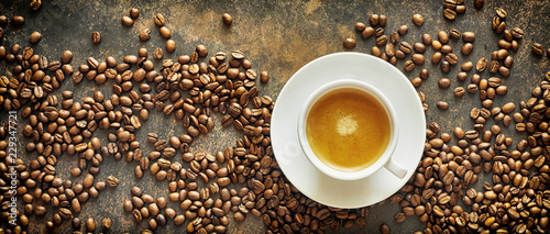 Panorama banner of roasted coffee beans and coffee