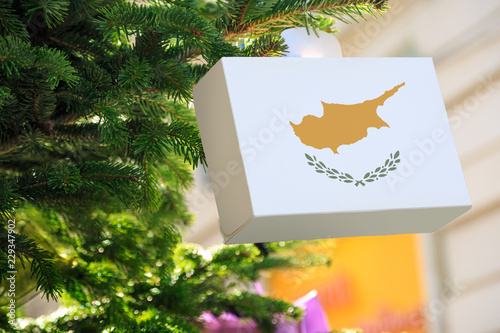 Tableau sur toile Cypriot flag printed on a Christmas gift box