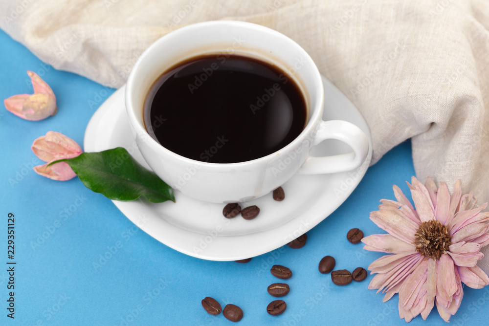 Cup of coffee on a blue table Cup of coffee on a blue table