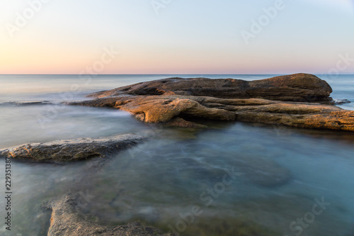 The wild sea beach with stones at sunrise. Bulgaria © Alexey Tyurin