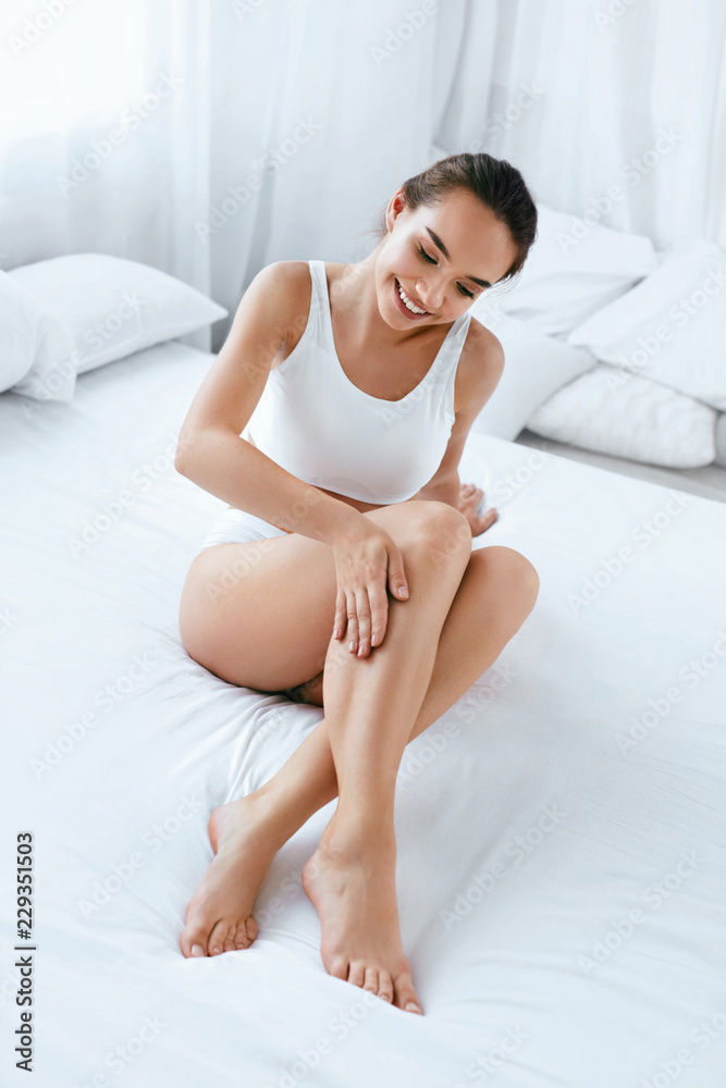 Body Care. Beautiful Woman with Long Legs, Healthy Soft Skin Stock