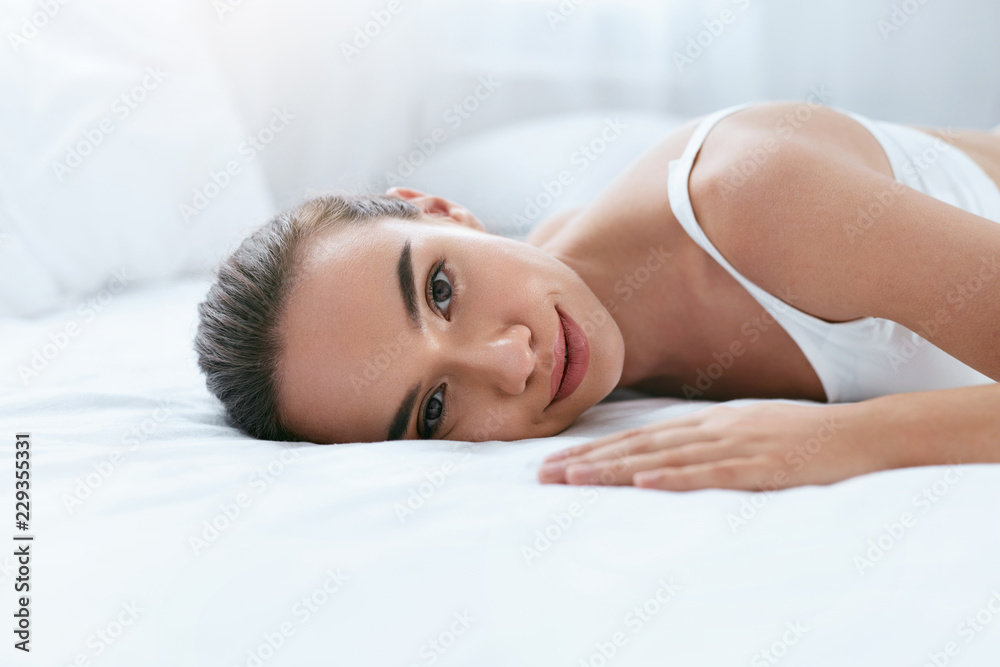 Beauty Face. Beautiful Woman With Healthy Skin On White Bed Beauty Face. Beautiful Woman With Healthy Skin On White Bed